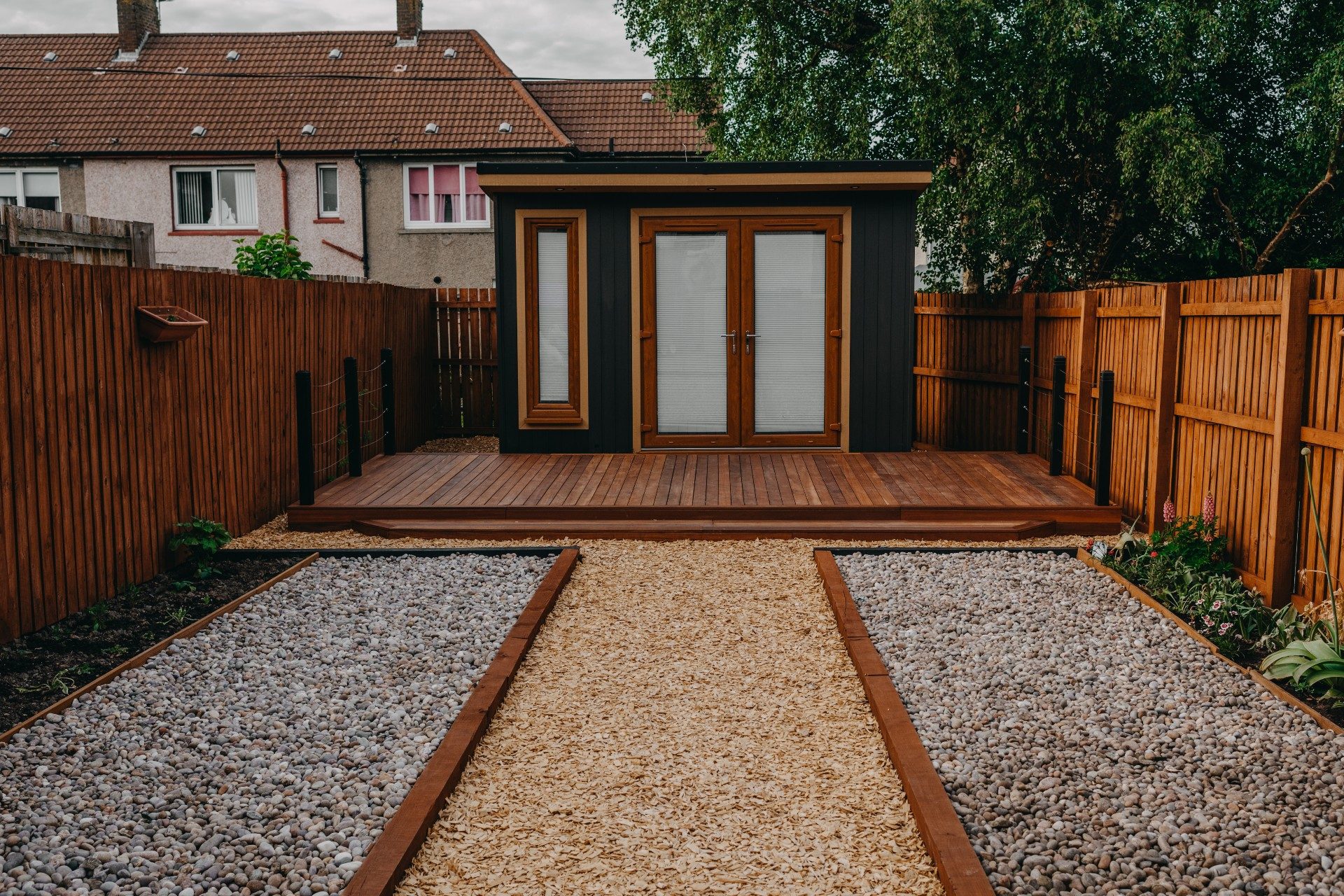 Contemporary garden room with stone pathway