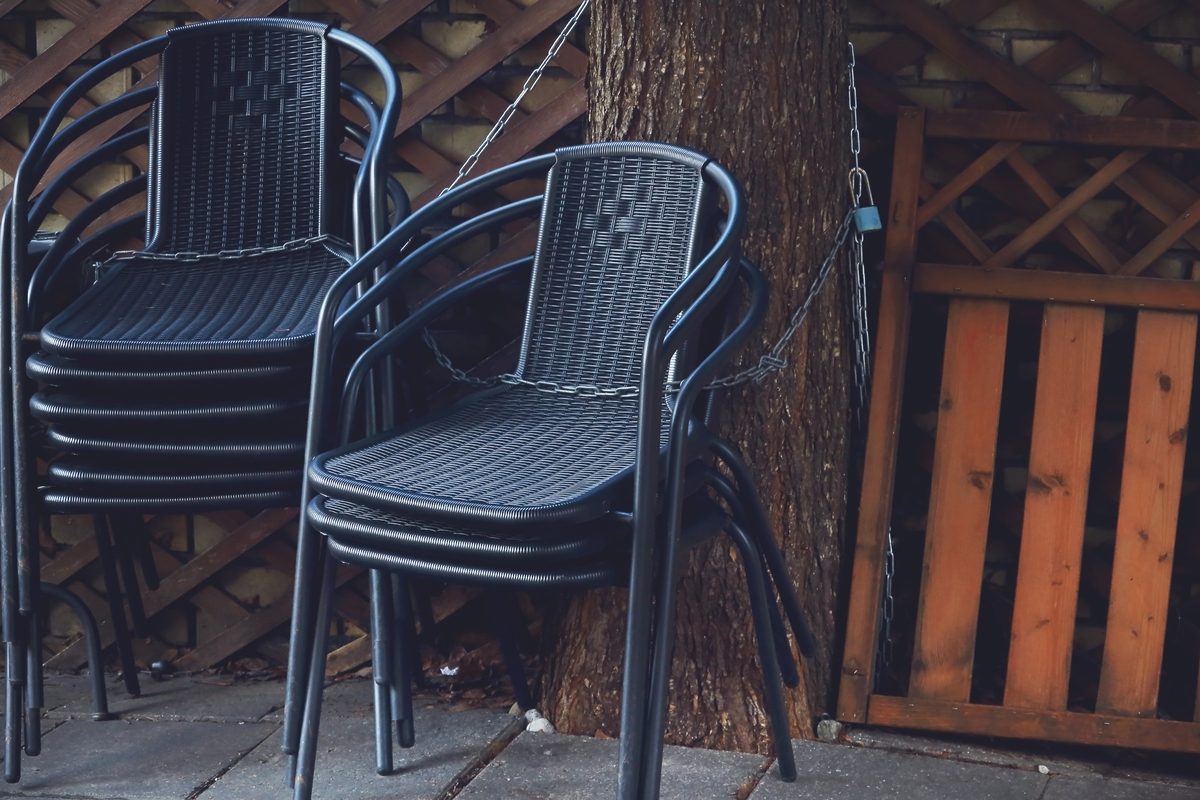 A set of stacked patio chairs