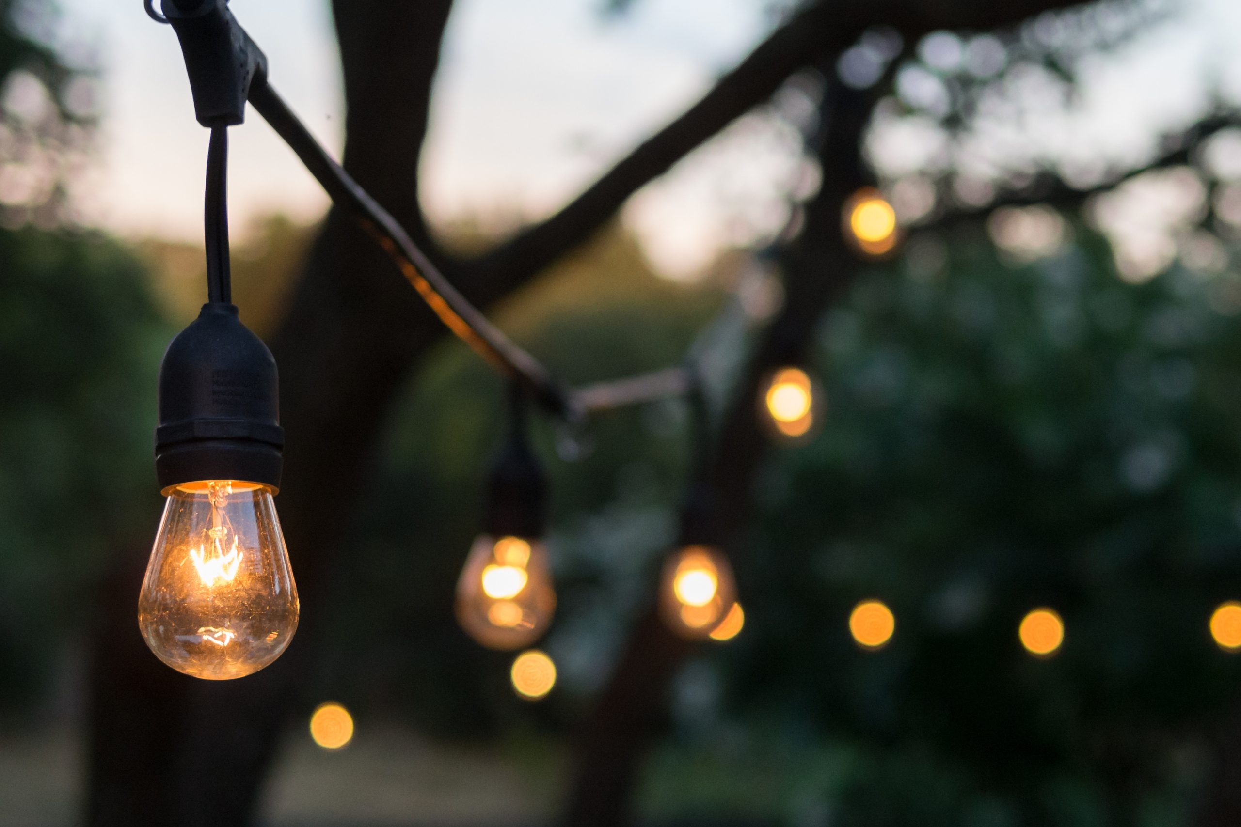 Hanging string lights outside