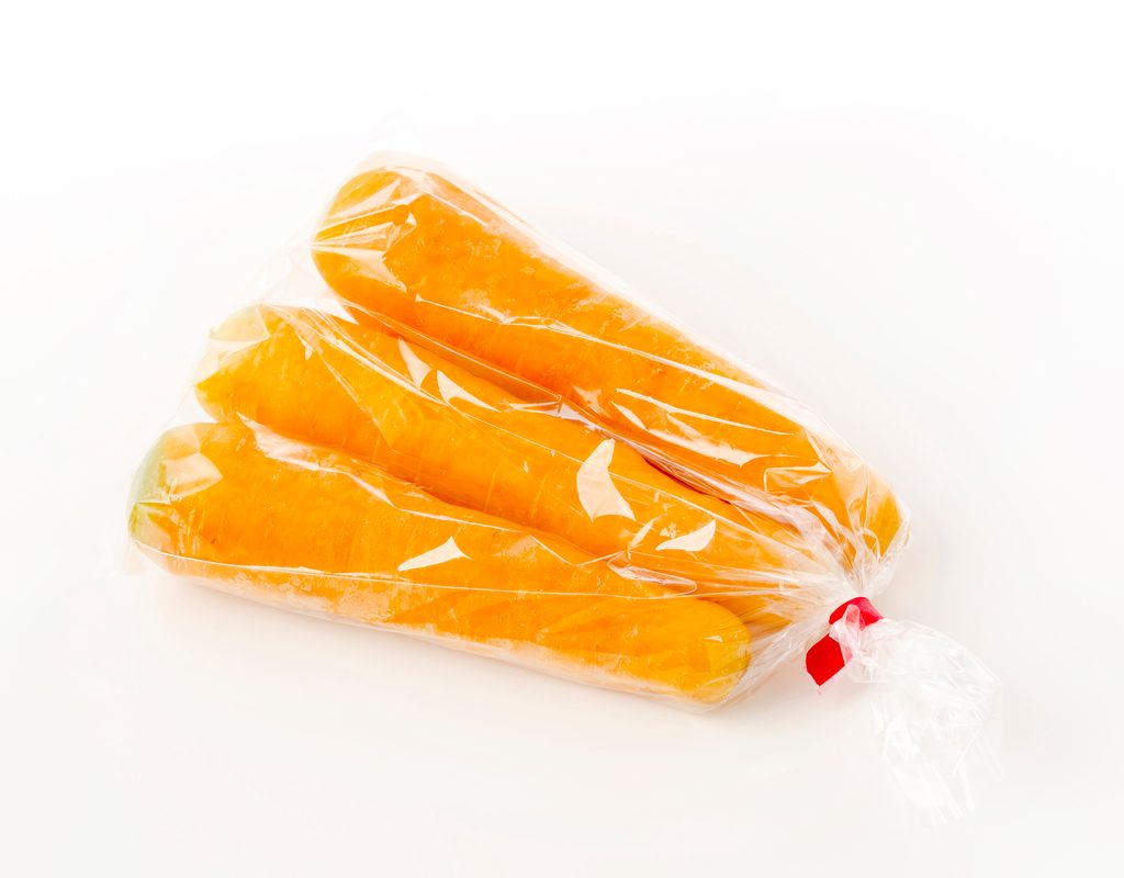 whole carrots in a plastic bag