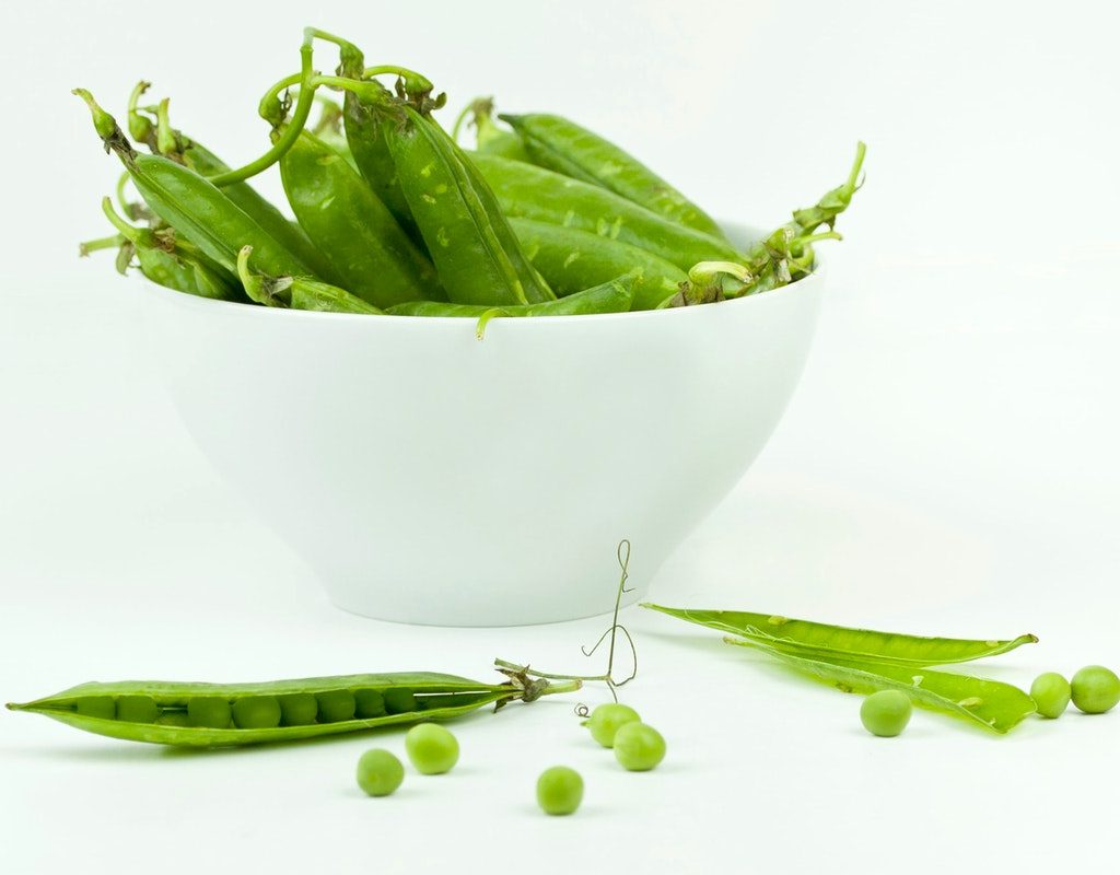 Harvested peas in a bowl