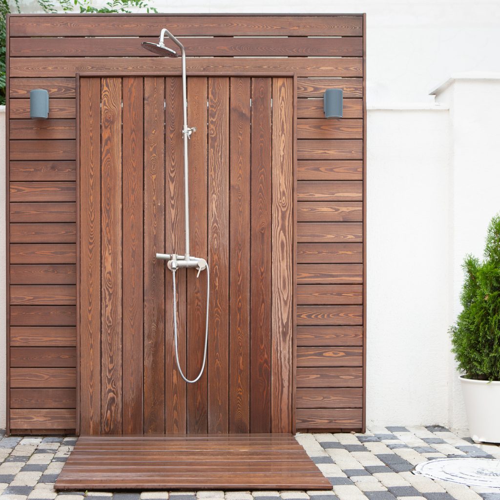 Outdoor shower in backyard