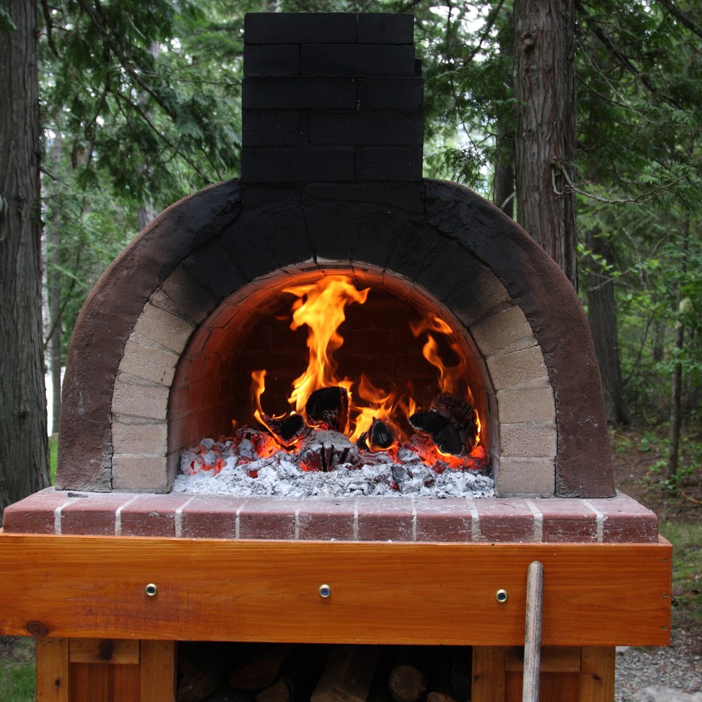 Fire roaring in pizza oven