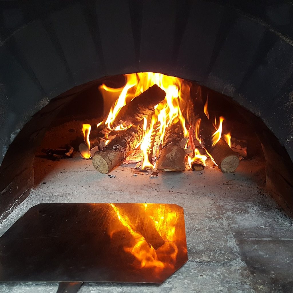 Pizza oven with lots of wood