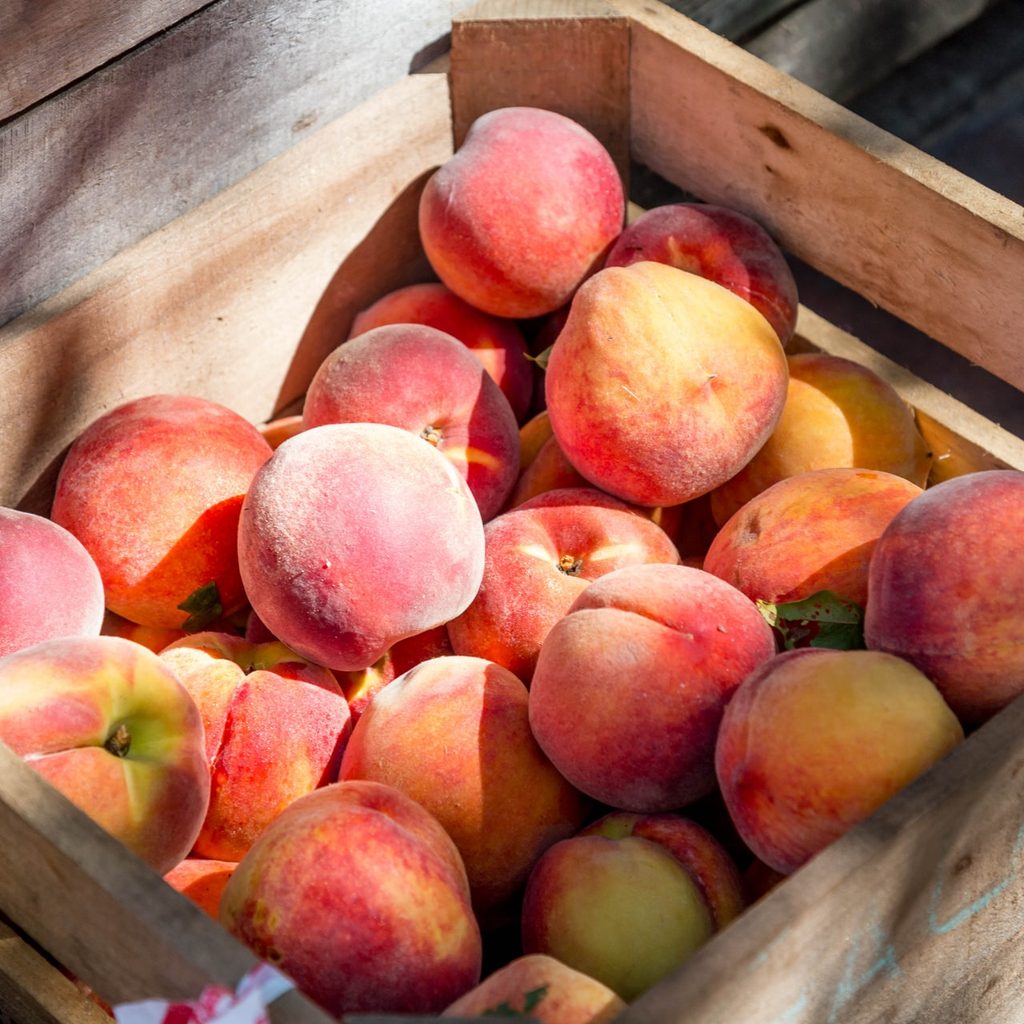 Peaches in a container