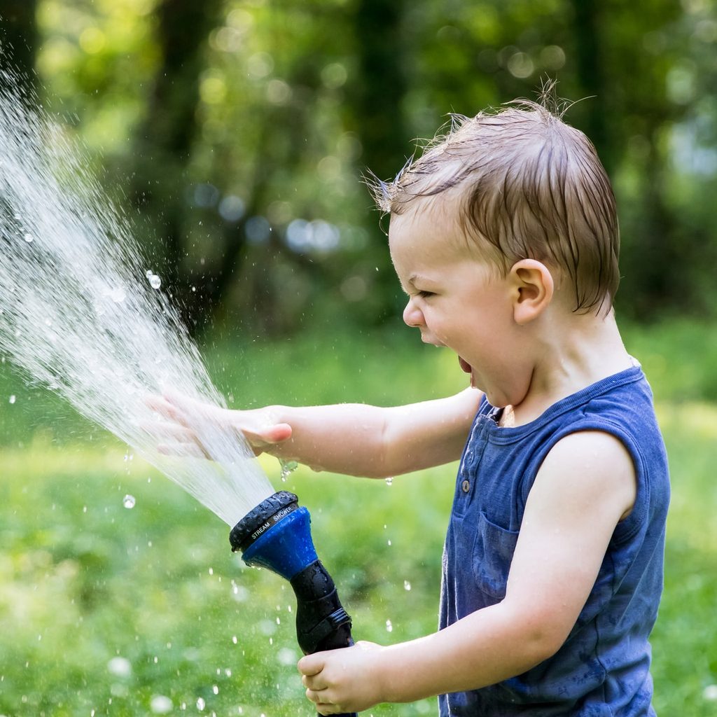 playing in the water hose