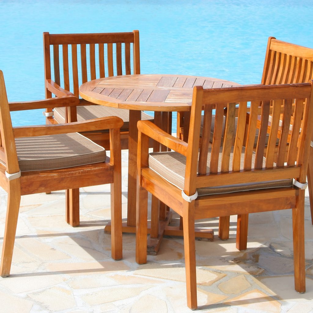 Wooden furniture by the pool