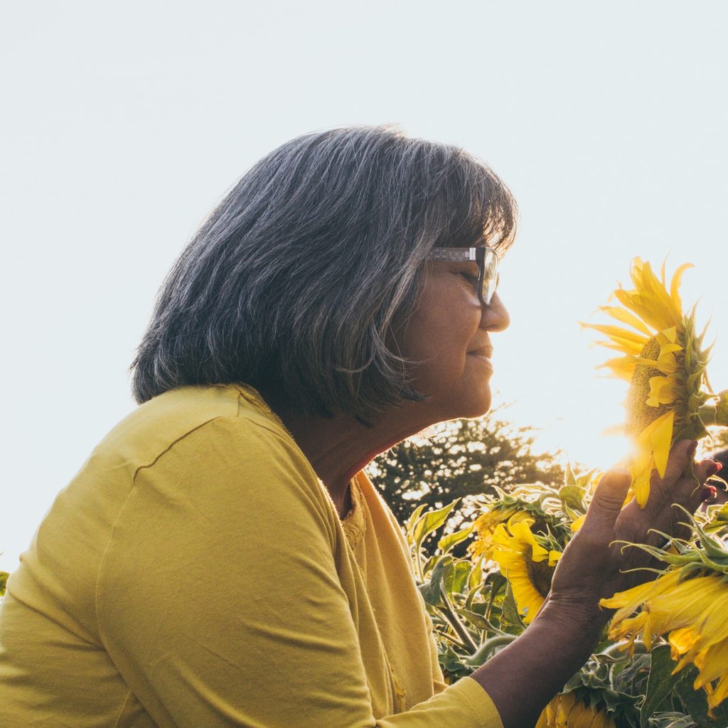 woman with sunflowers