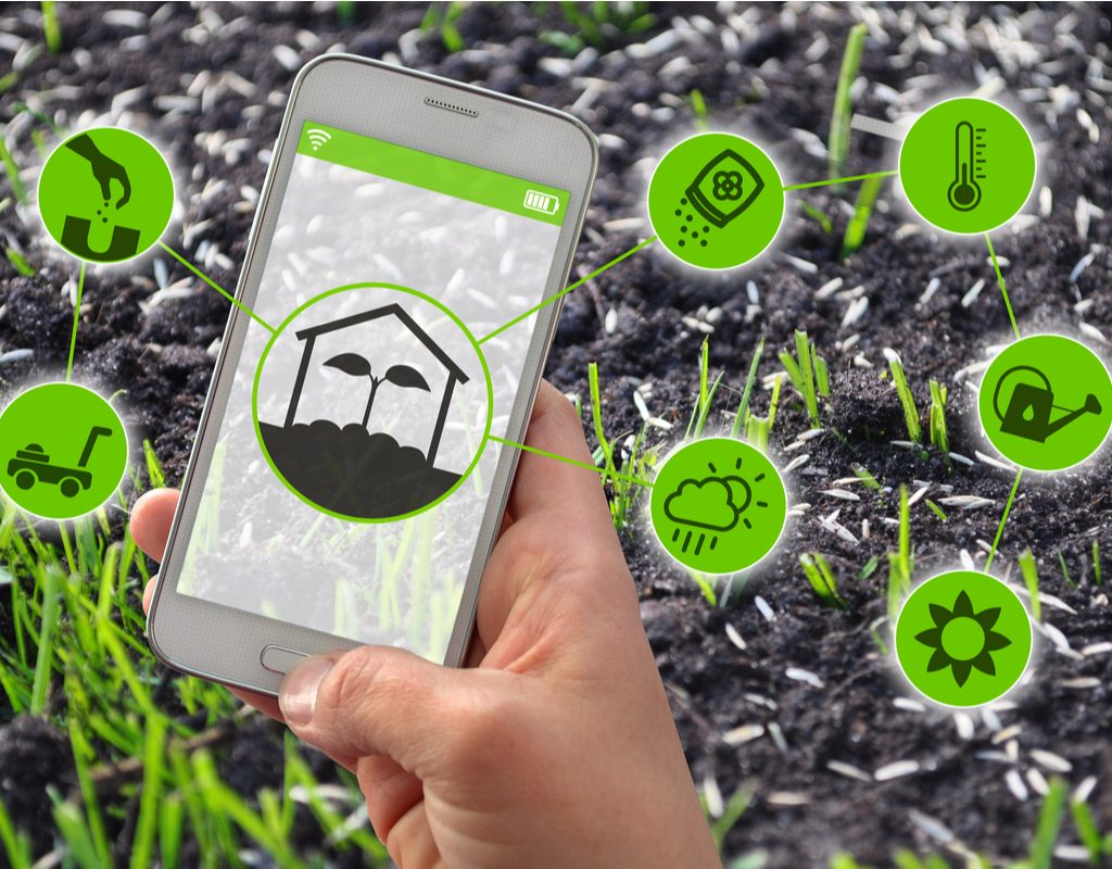 A phone surrounded by garden app bubbles