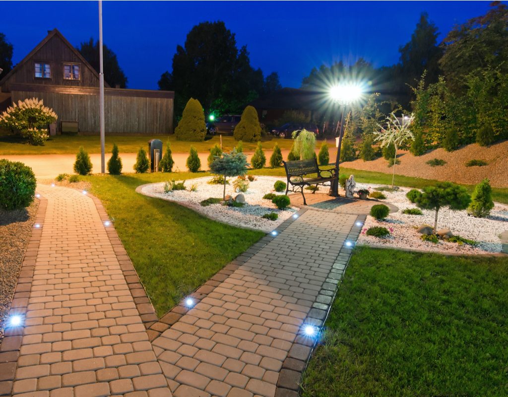 A garden sitting area with lights