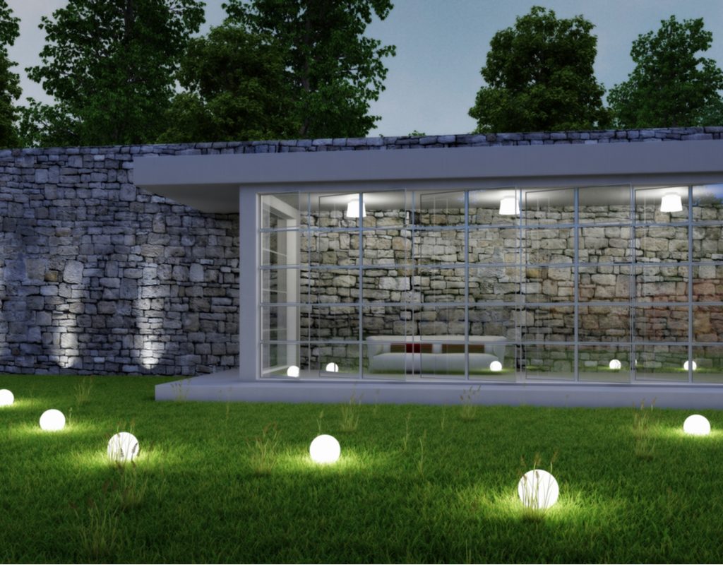 An outdoor sitting area with sphere lights surrounding it