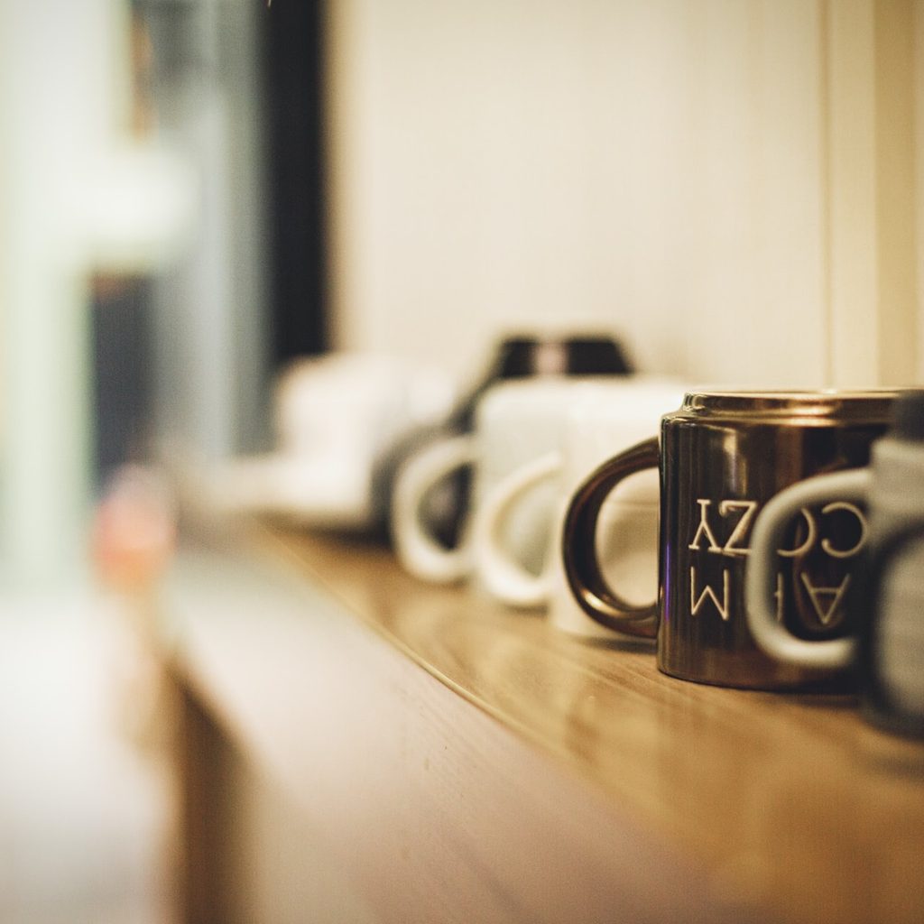 mugs lined on shelf
