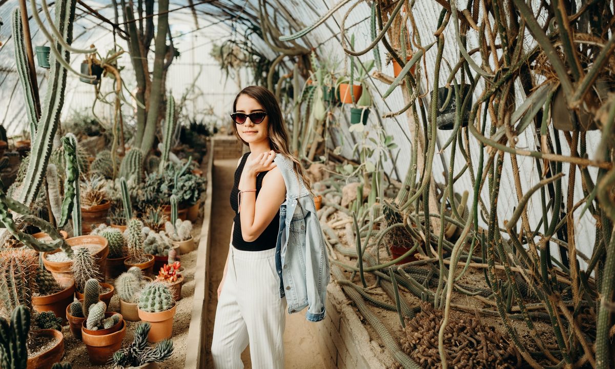 Girl in cactus shop