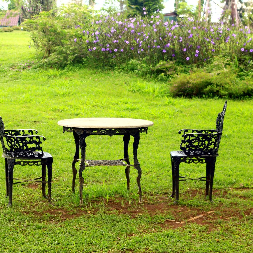 Wrought iron furniture chairs and table