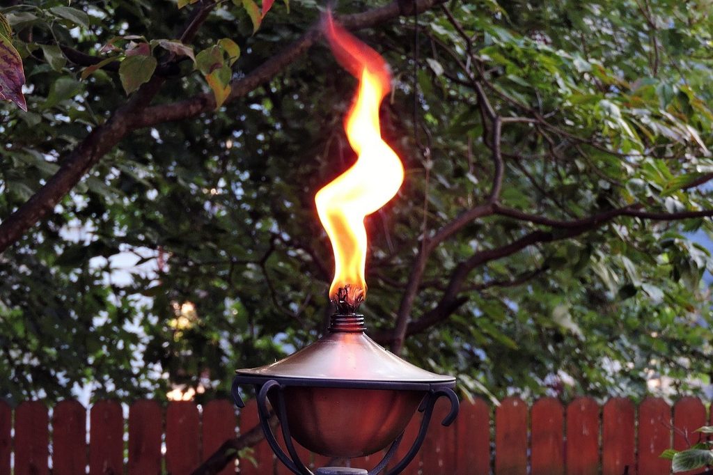 A citronella torch burning