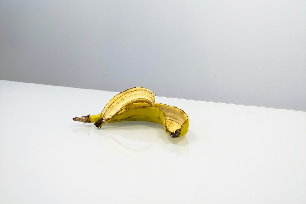 A banana peel in a white room