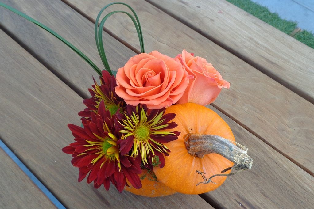 Fall flowers in a hollow pumpkin