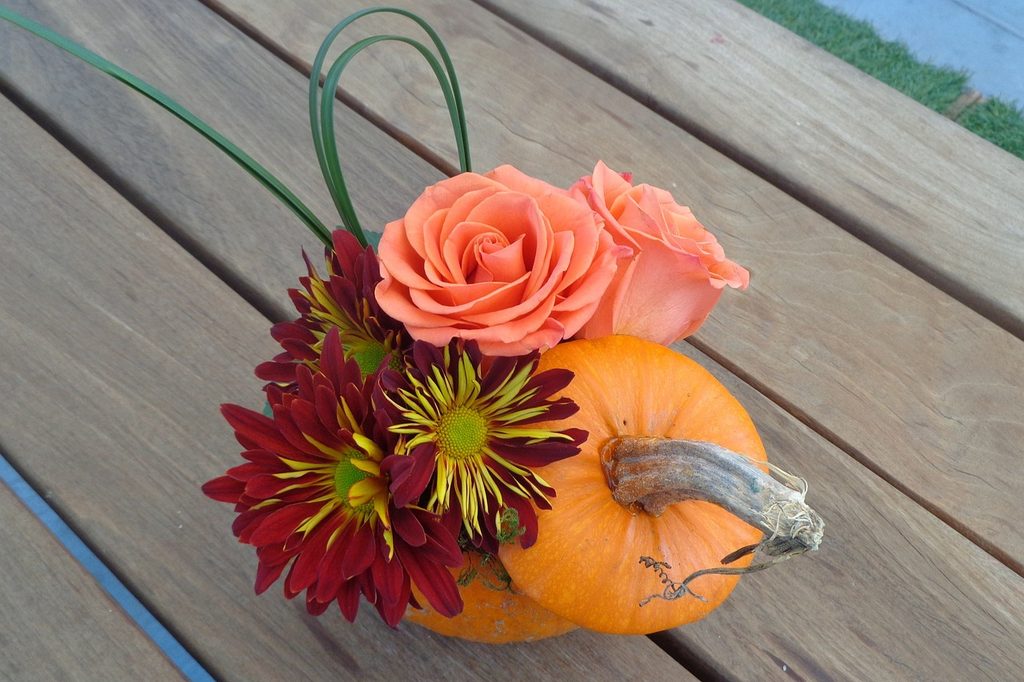 Fall flowers in a hollow pumpkin