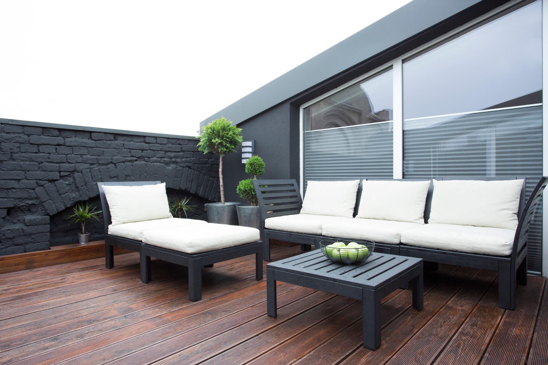 Couch, lounger, and table on outdoor patio