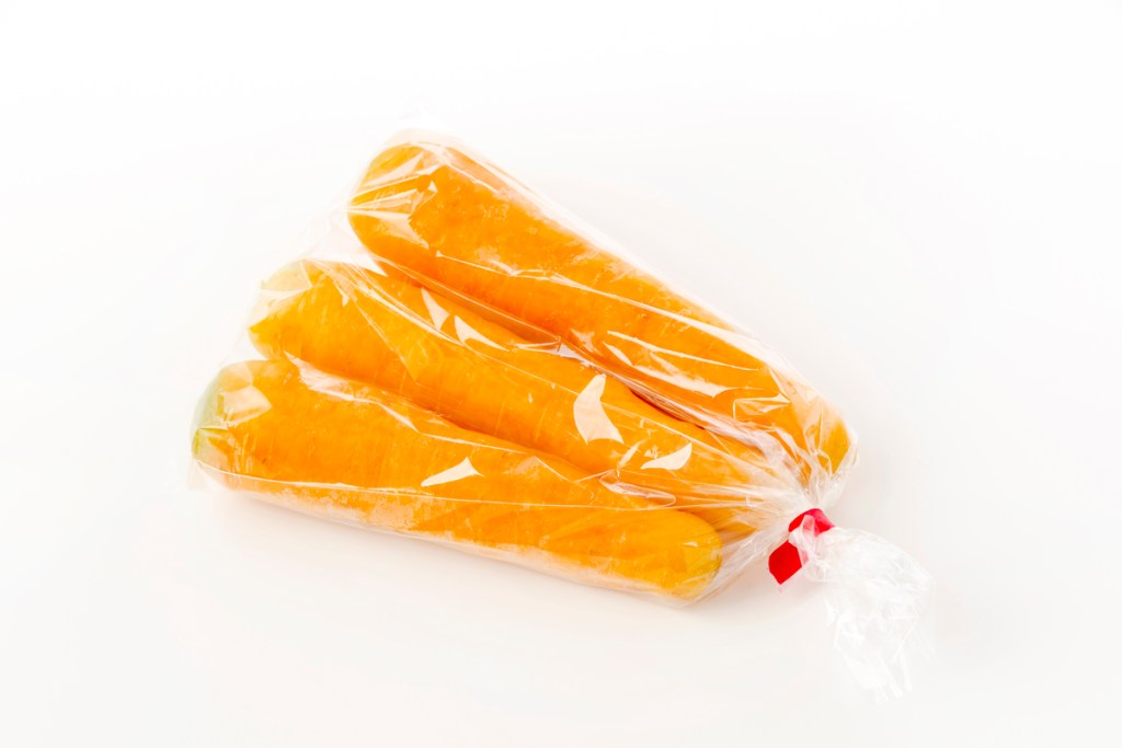 whole carrots in a plastic bag