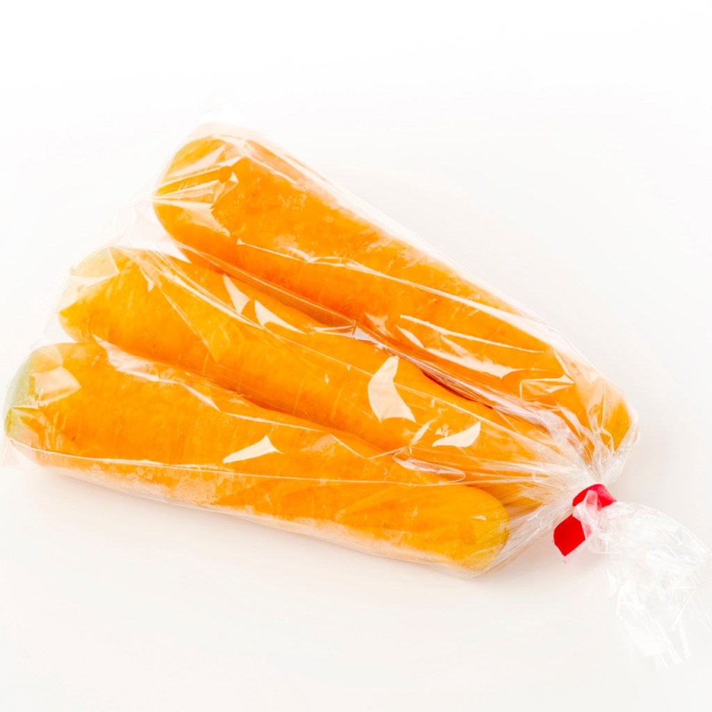 whole carrots in a plastic bag