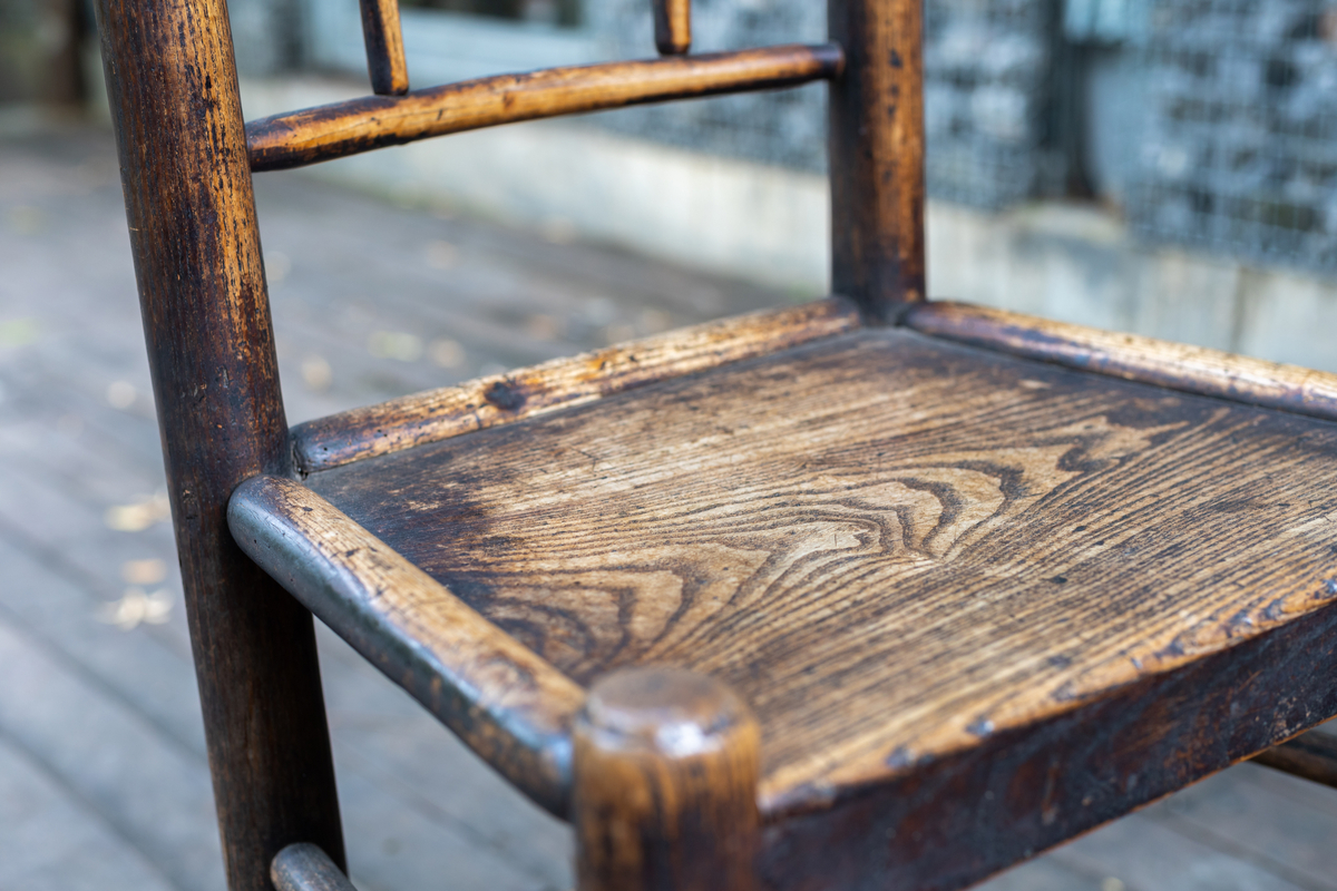 A weathered wooden chair