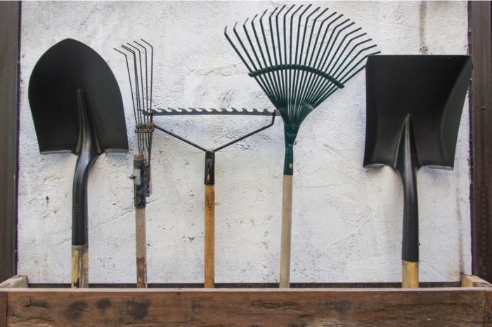 garden tools hanging on a wall