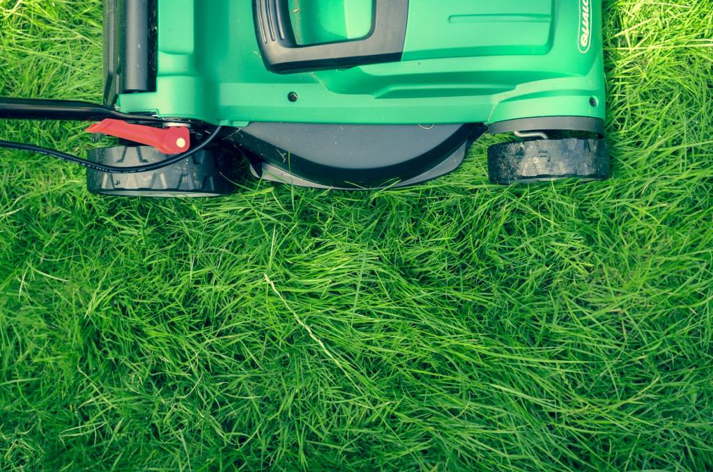 Cutting grass with a mower