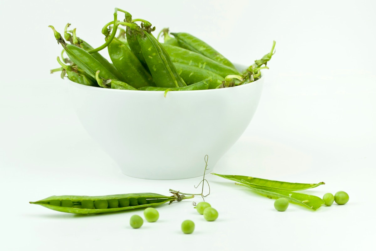 Harvested peas in a bowl