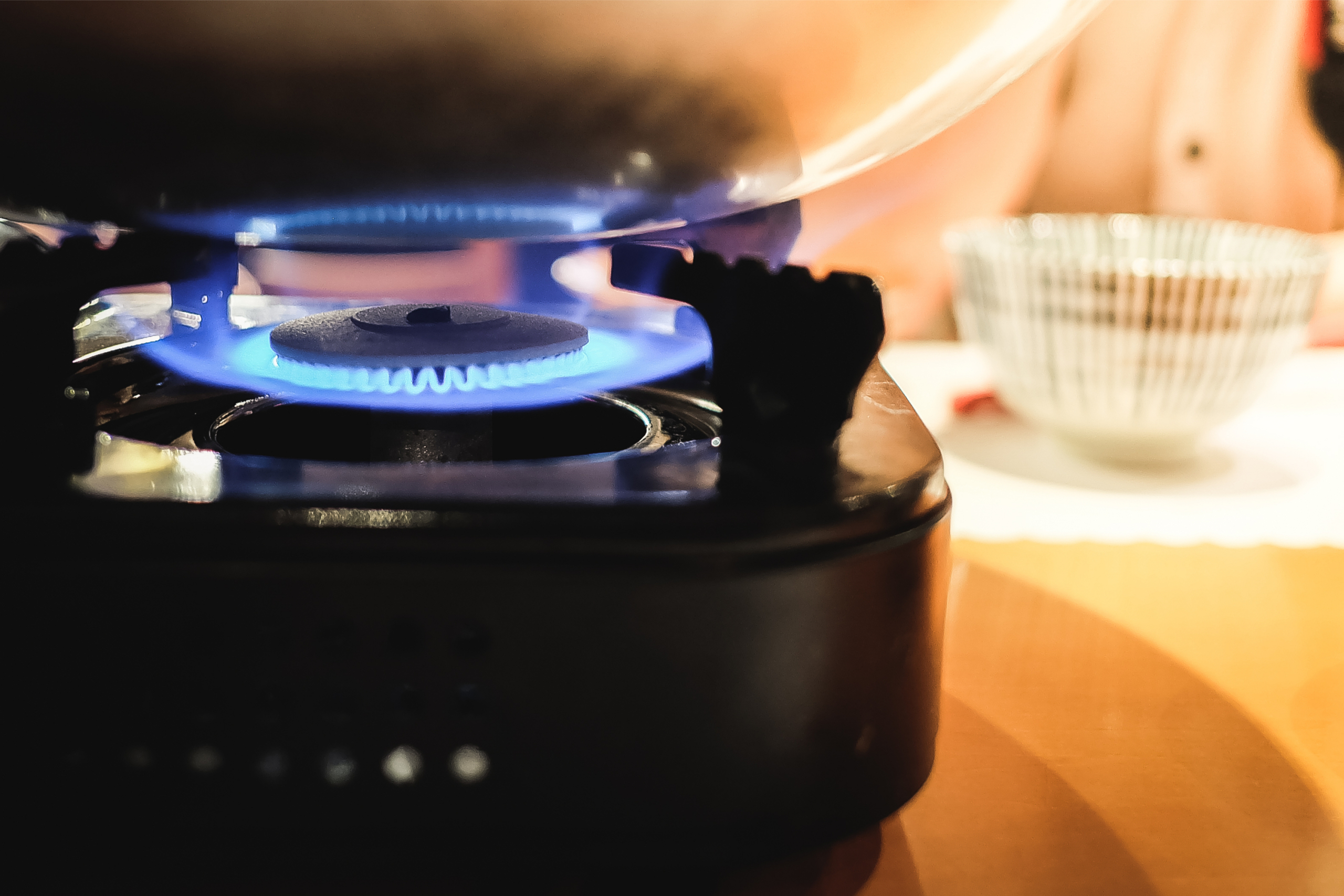 Portable stove heating a pot