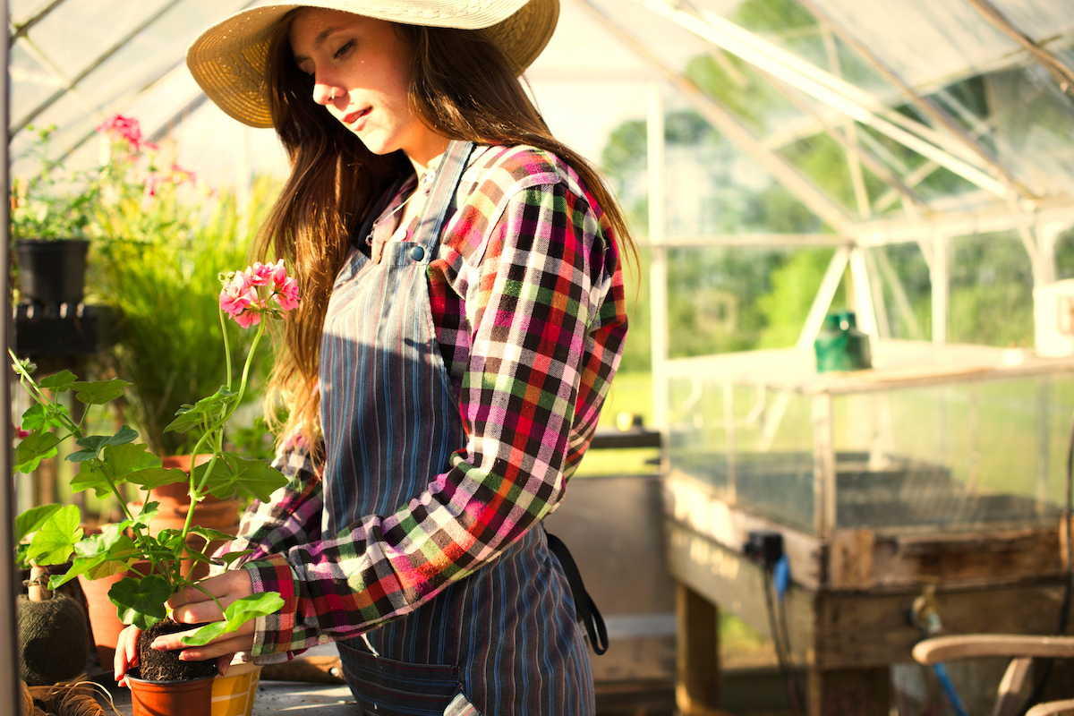 woman working in greenhouse