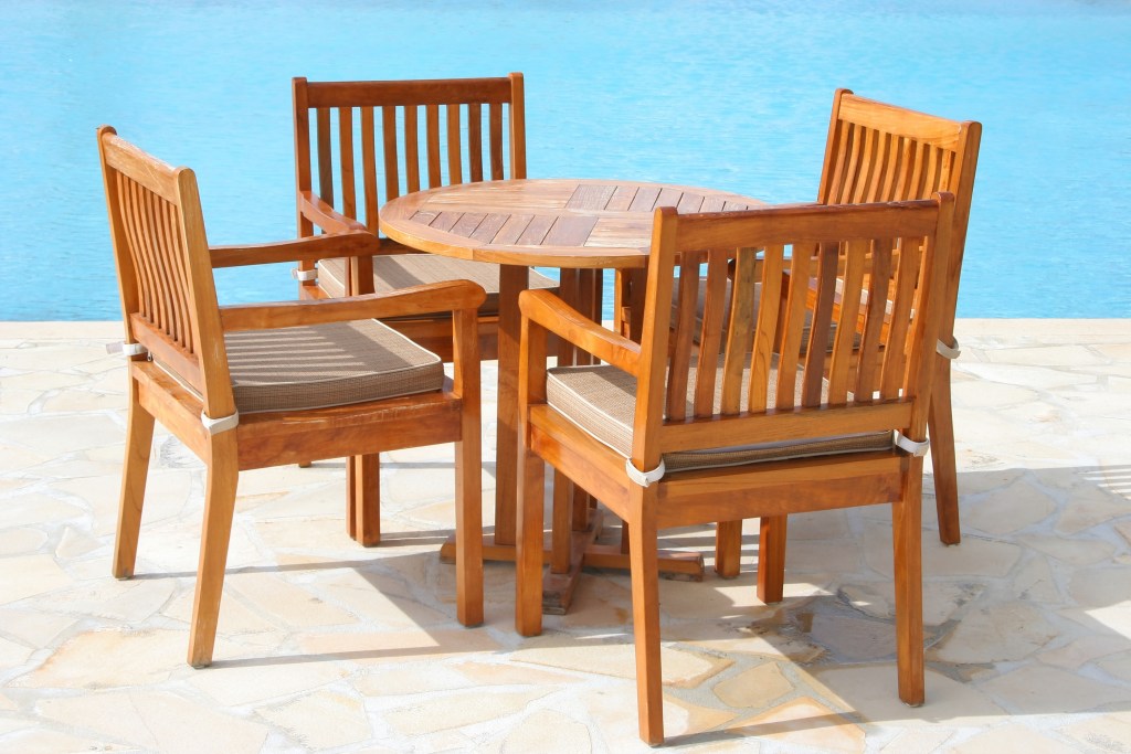 Wooden furniture by the pool