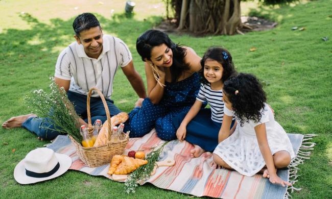 Ethnic family enjoys a picnic