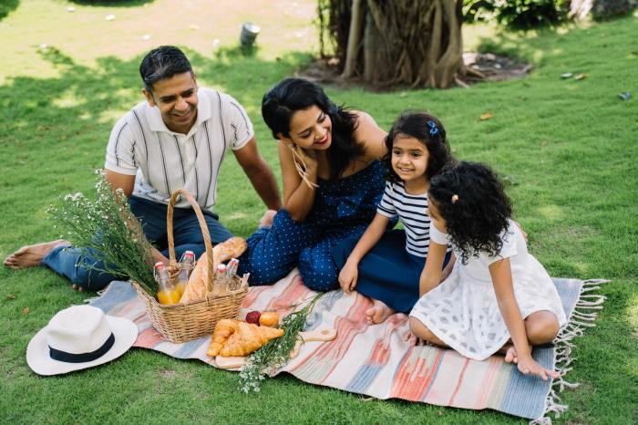 Ethnic family enjoys a picnic