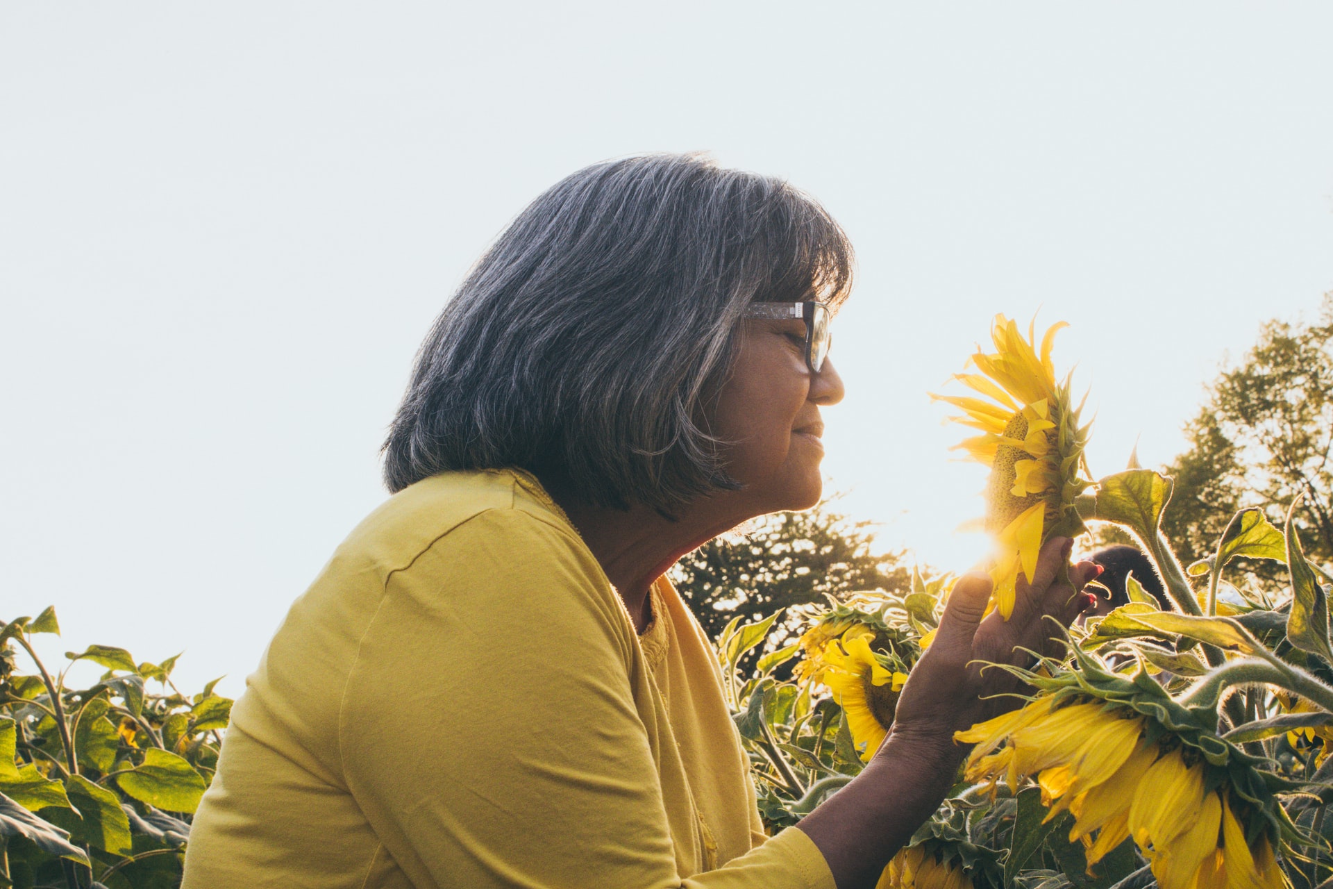woman with sunflowers