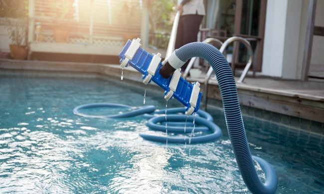 Man cleaning pool