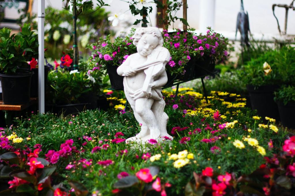 Flower garden with statue