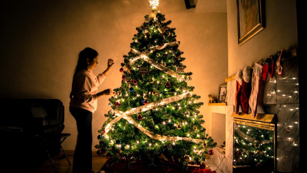 Decorating a Christmas tree