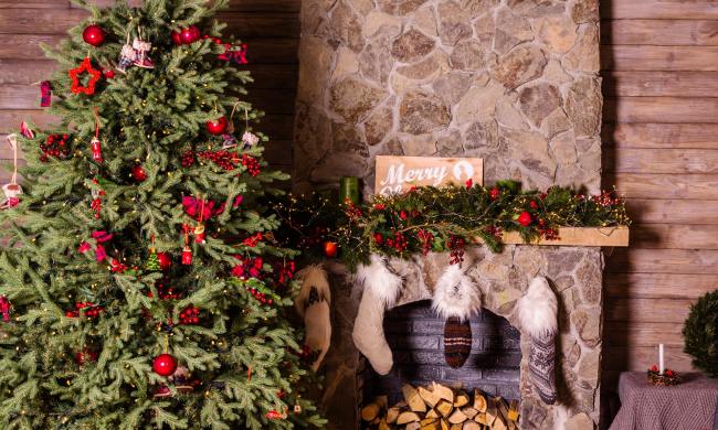 Christmas tree by the fireplace
