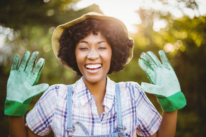A happy gardener with gloves