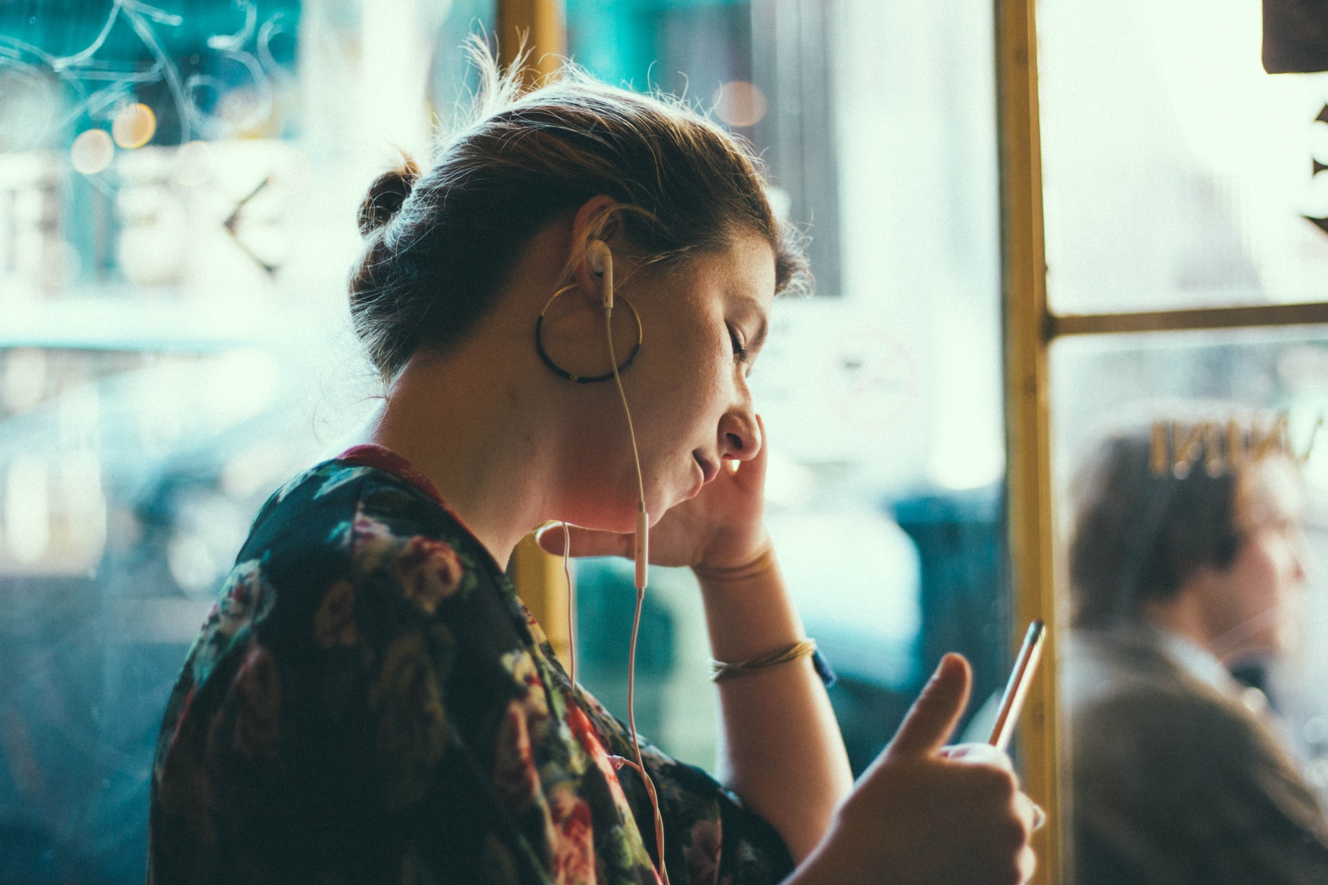 person listening with headphones