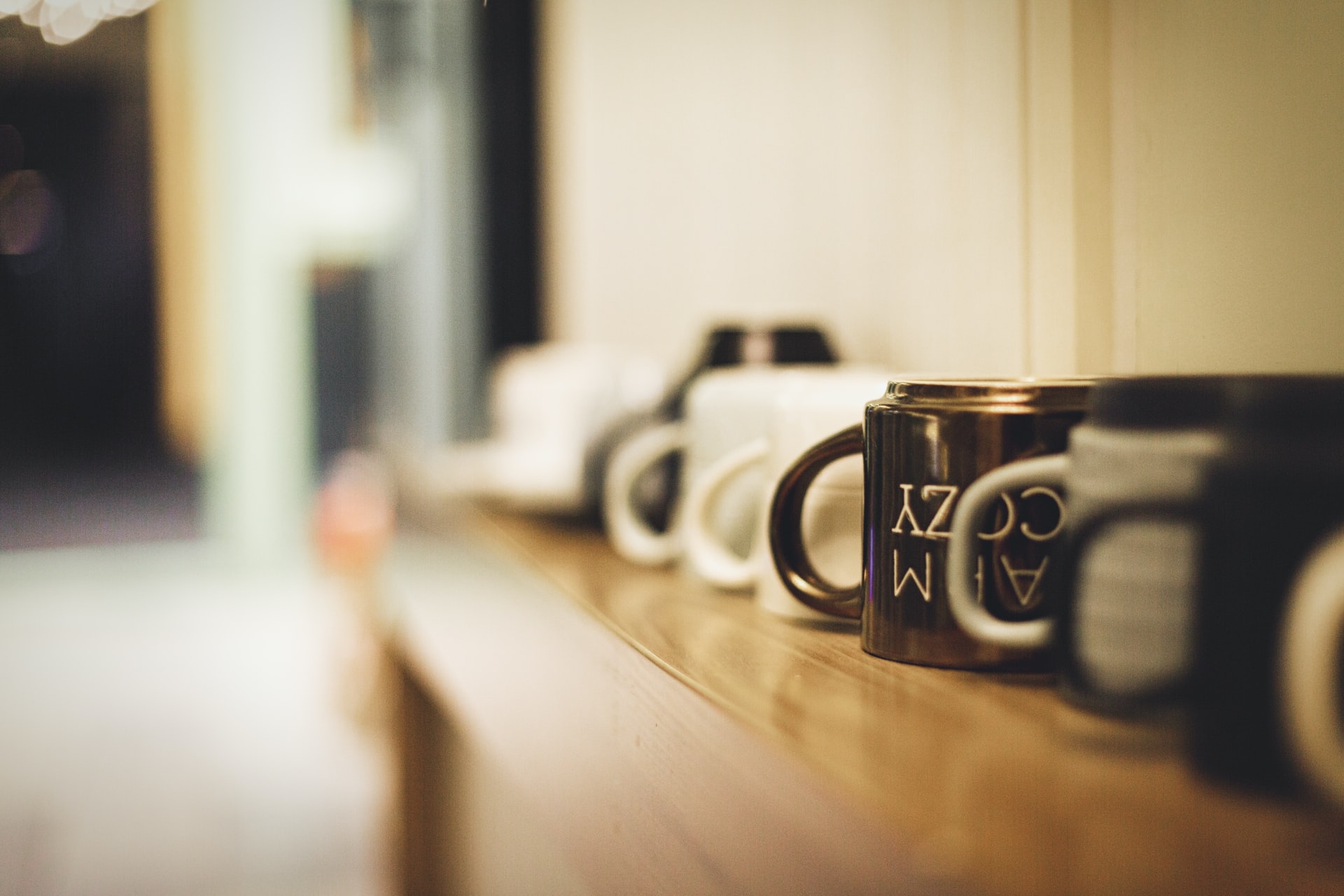 mugs lined on shelf