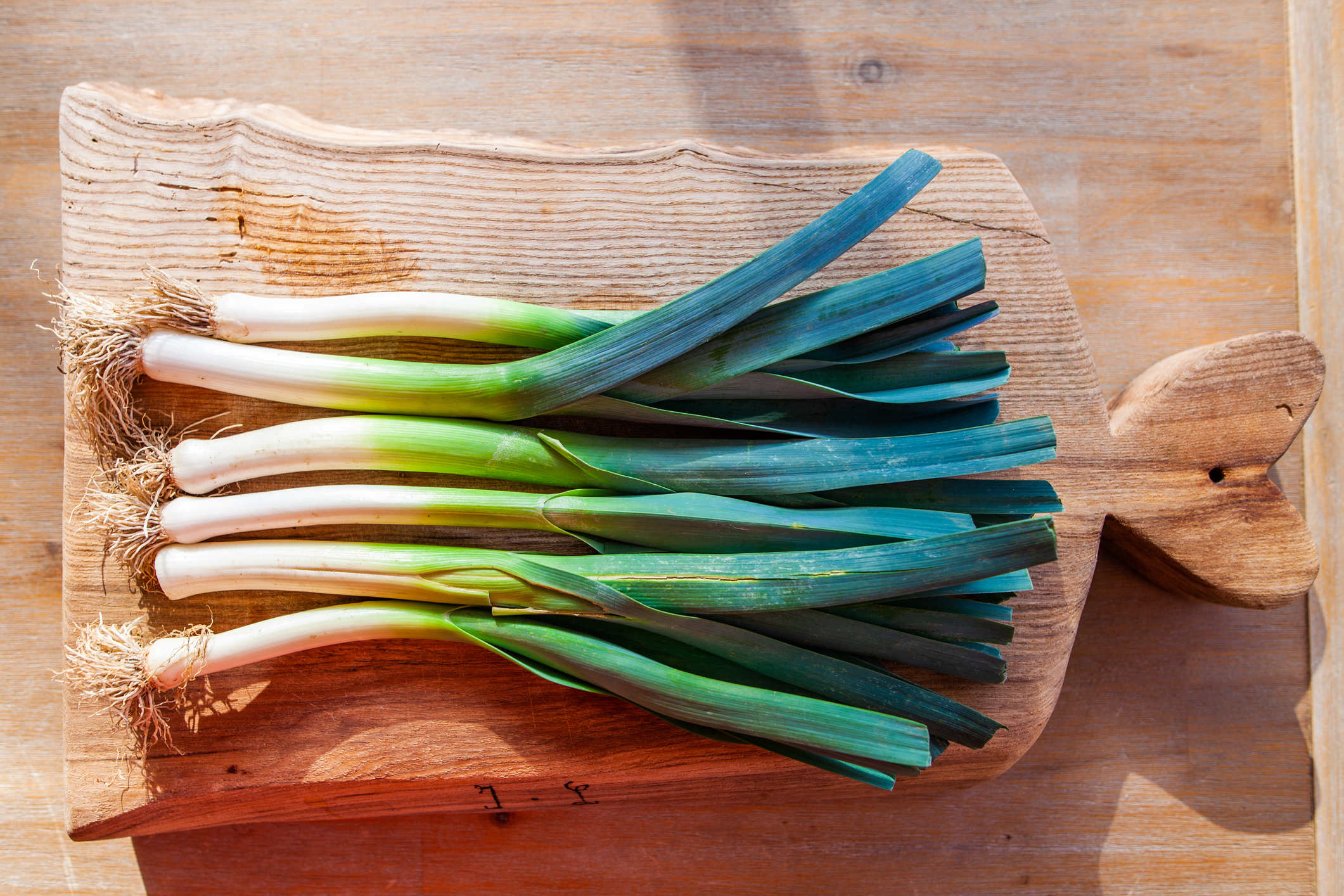 Leeks on a cutting board