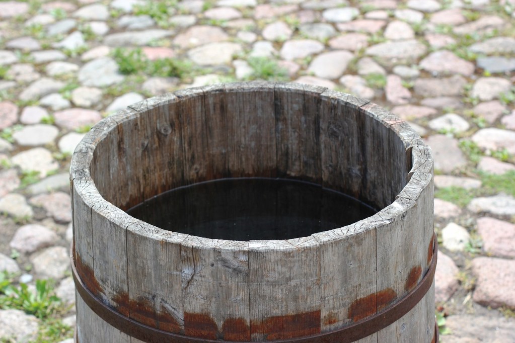 A wooden barrel full of water