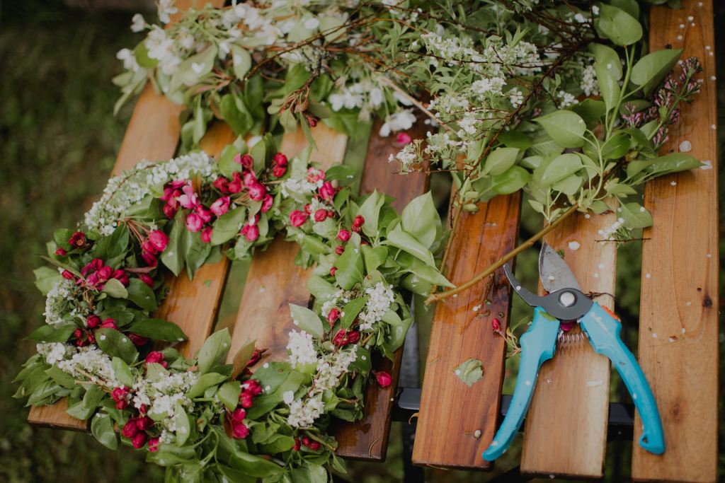 Flower wreath on wooden table