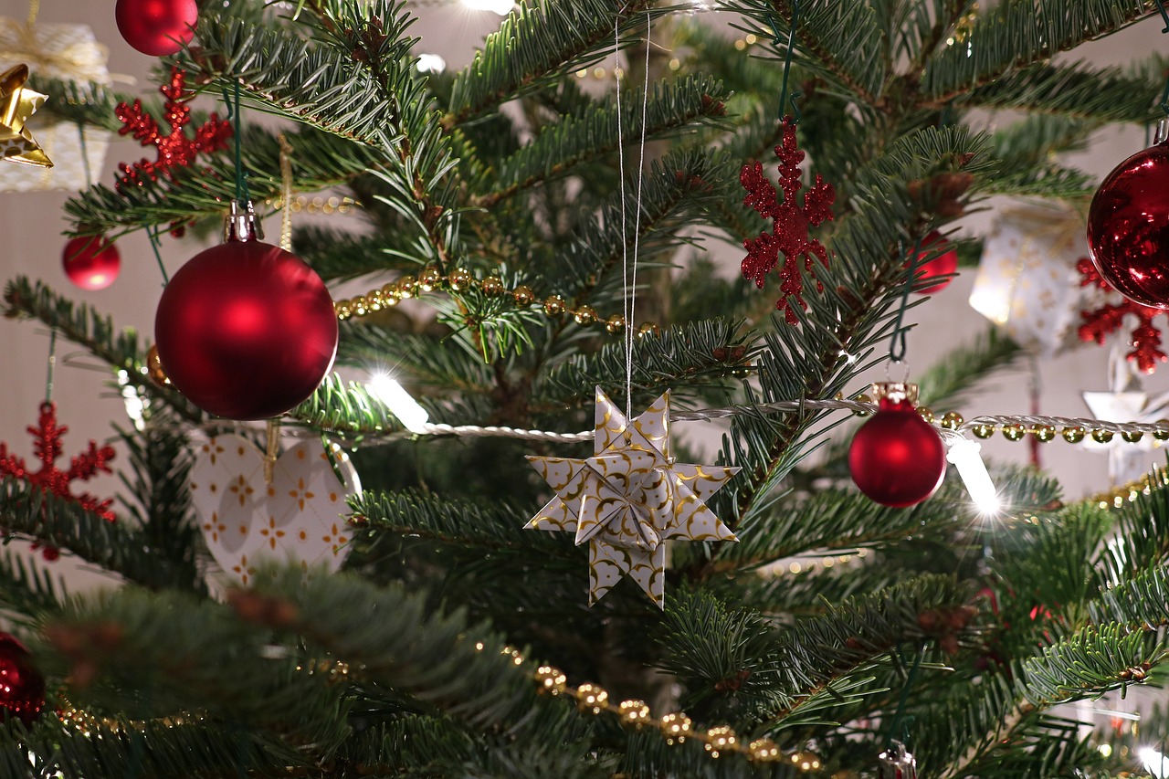 Christmas tree decorated with red and white baubles.