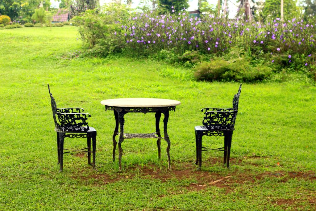 Wrought iron furniture chairs and table