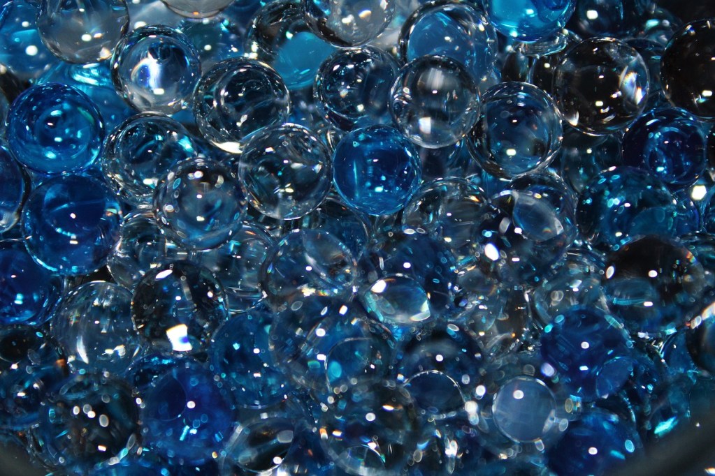 Blue and clear water beads